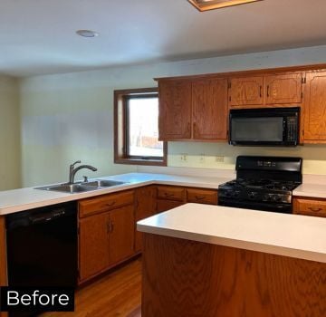 An image of kitchen remodel before construction with existing cabinetry and appliances in Naperville, IL