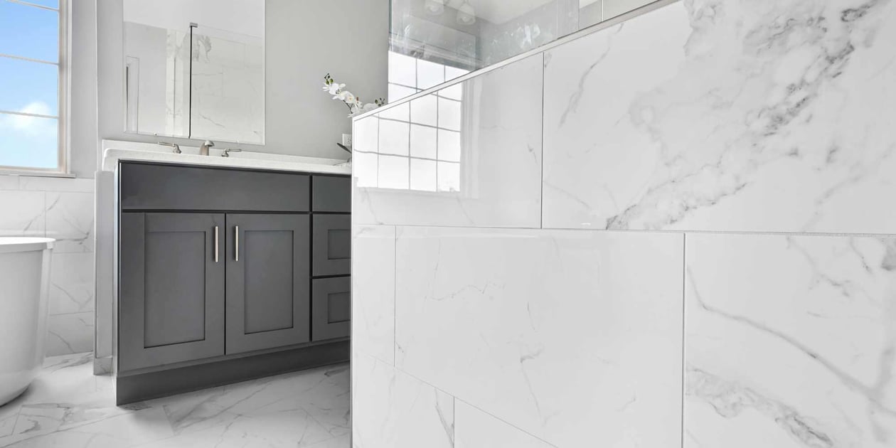 Sleek bathroom upgrade in Chicagoland featuring modern cabinetry and large format tile