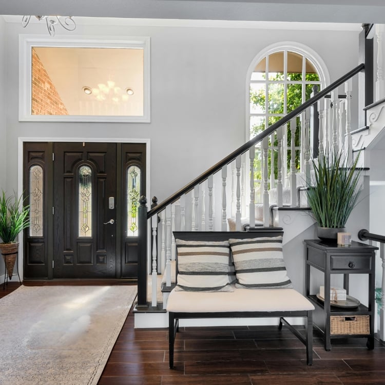 home entryway design with seating and storage