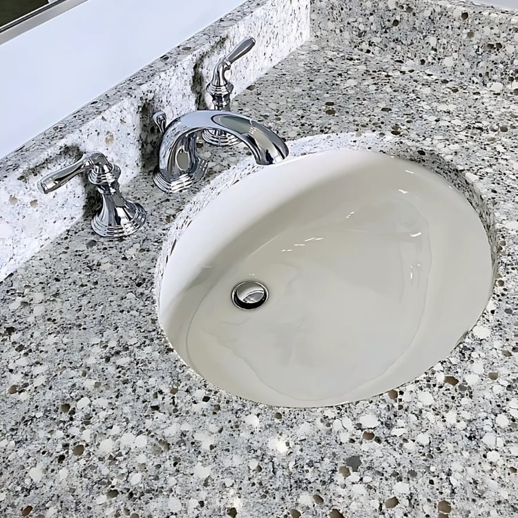 Detailed image of the sink and vanity countertop installed by J&J Construction in Oswego, IL