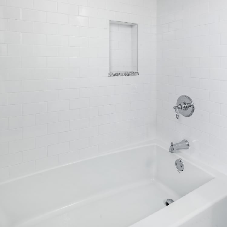 Image of the tub and shower in a bathroom remodel in Winfield, IL by J&J Construction