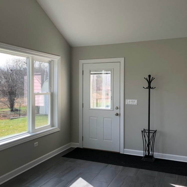 A Stylish Sunroom That Does More by J&J Construction