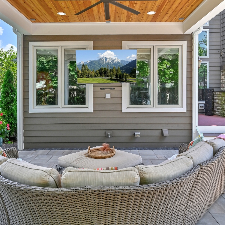 Covered Patio Provides Beautiful Outdoor Entertaining Space by J&J Construction