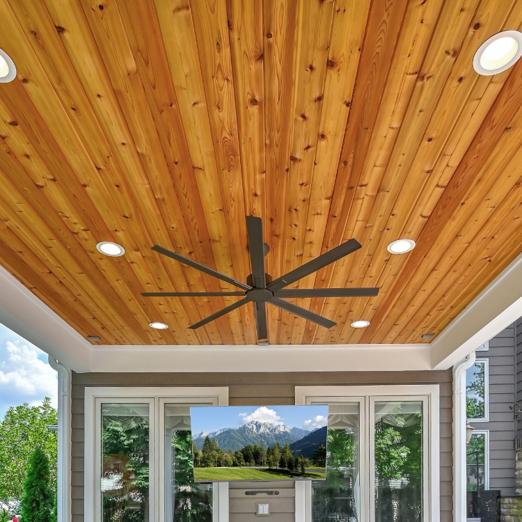 Covered Patio Provides Beautiful Outdoor Entertaining Space by J&J Construction