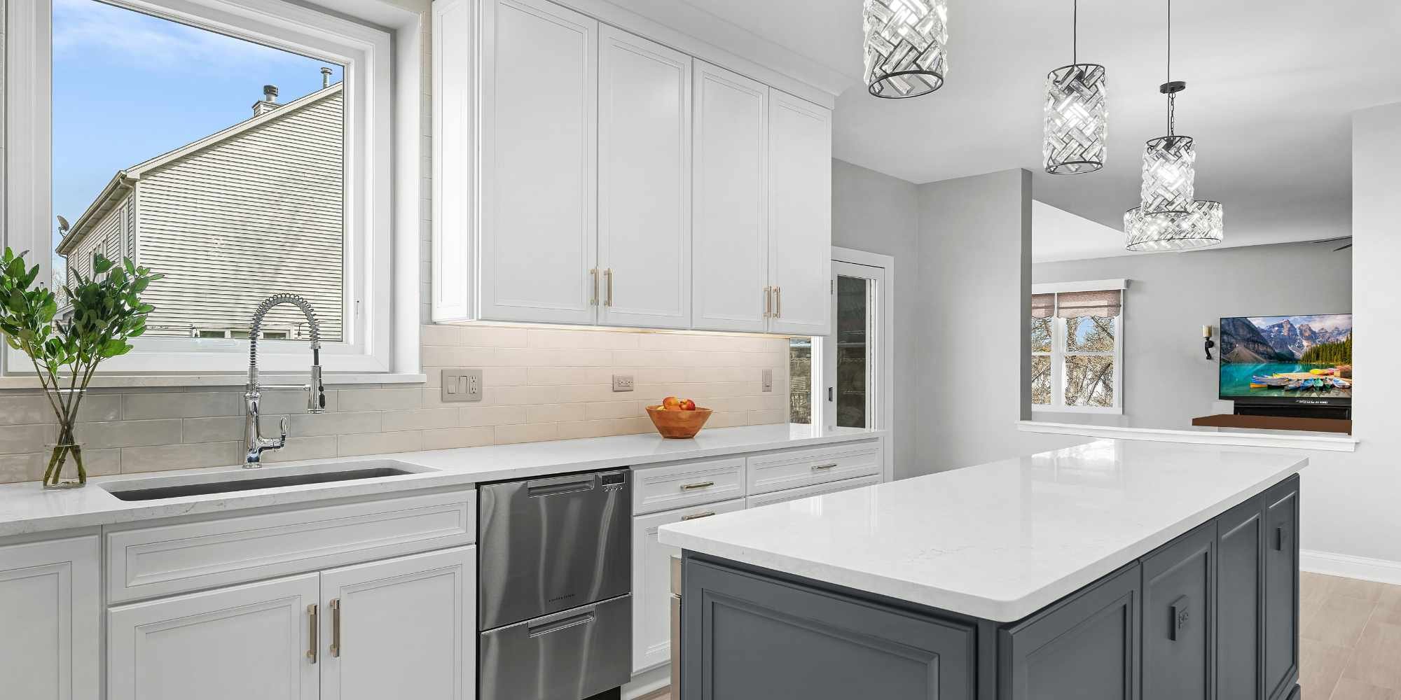 Image of modern kitchen remodel in Aurora, IL by J&J Construction with white cabinets and tile backsplash