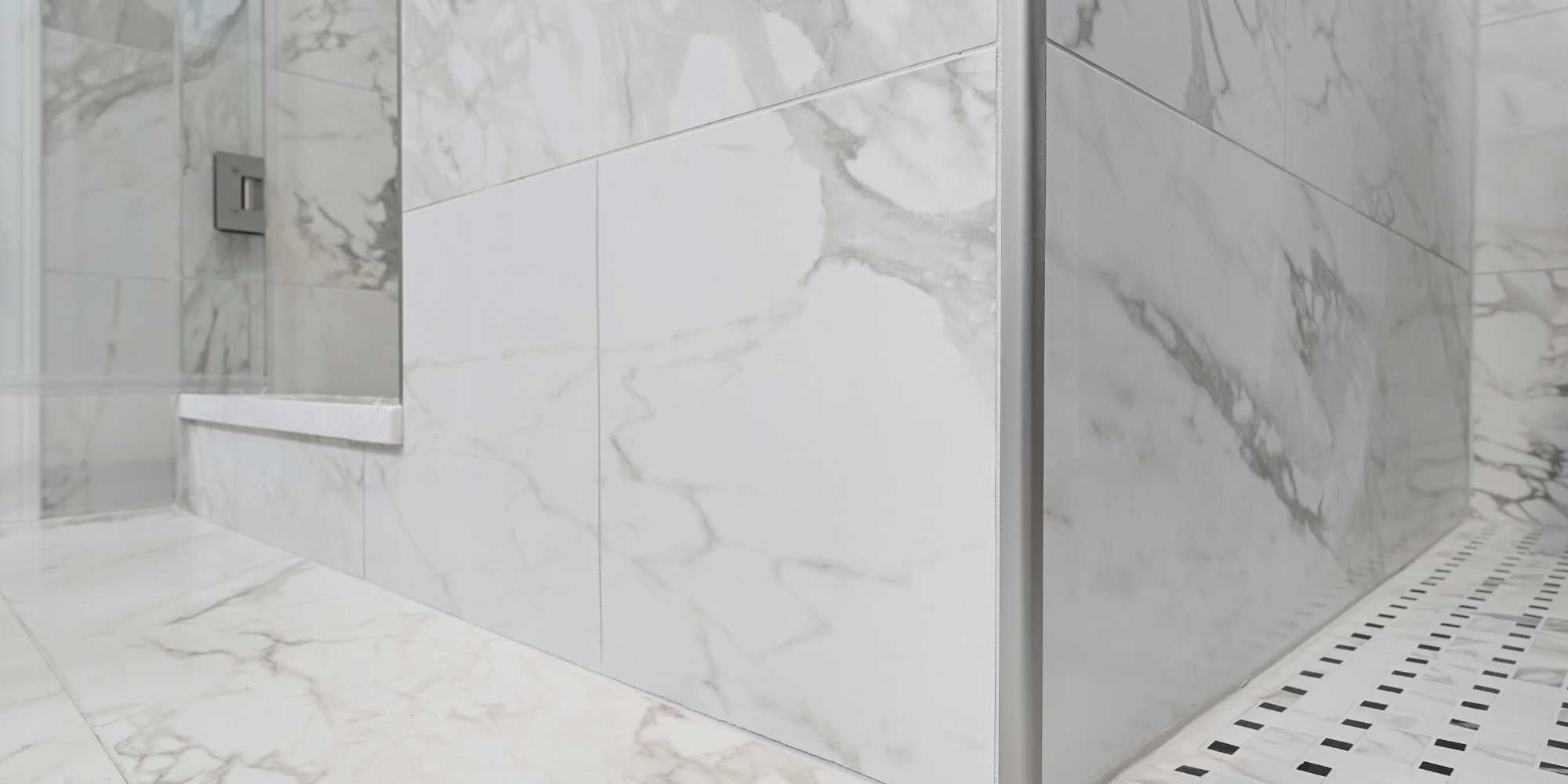 Image of the corner of the outside of the shower showing detail of the tile by J&J Construction