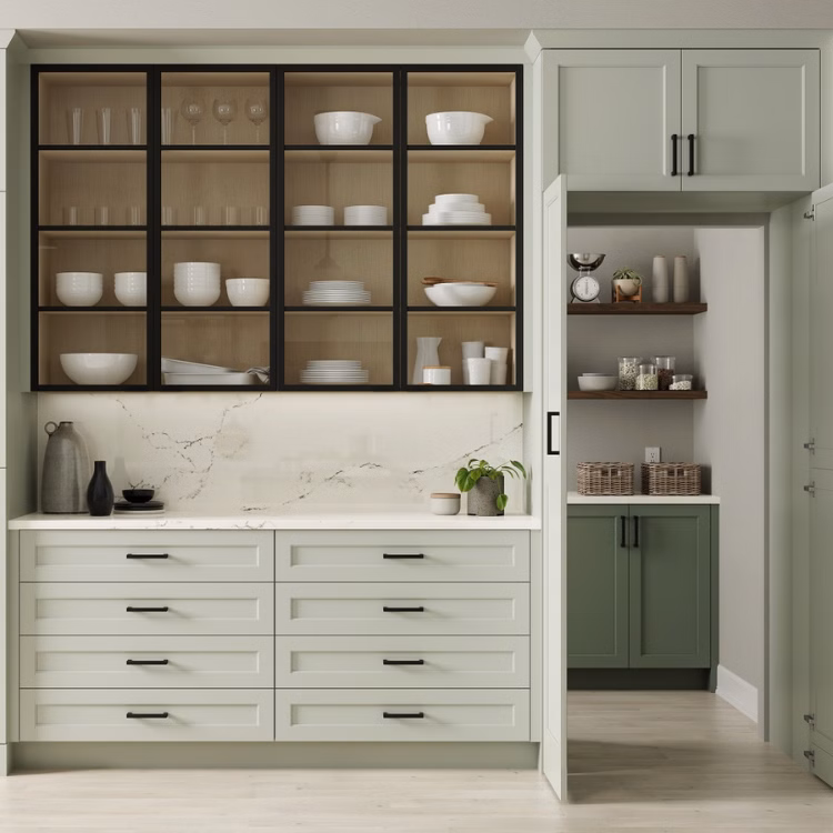 hidden pantry in pale green kitchen