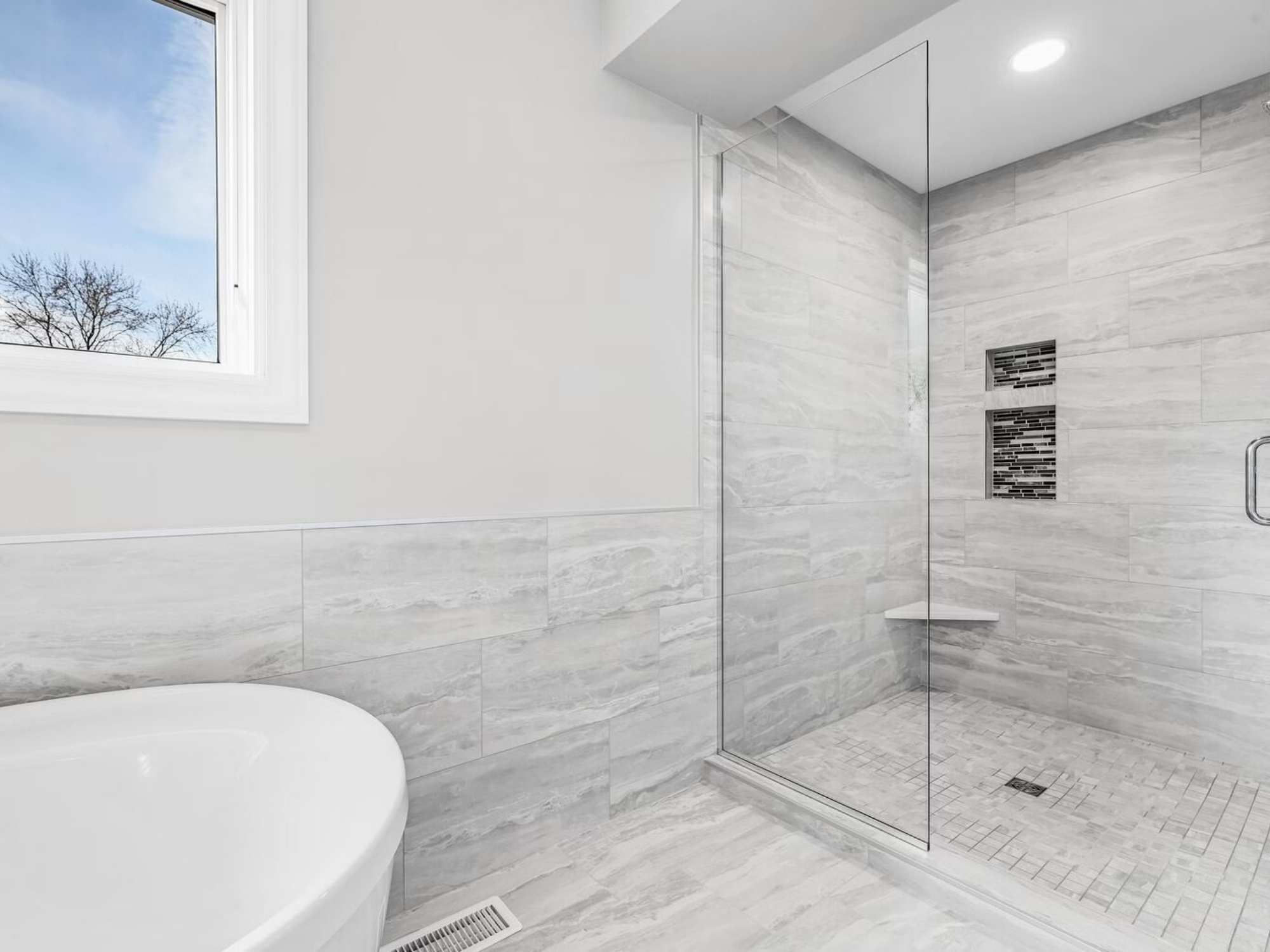Naperville bathroom remodel with soaking tub and walk-in shower by J&J Construction