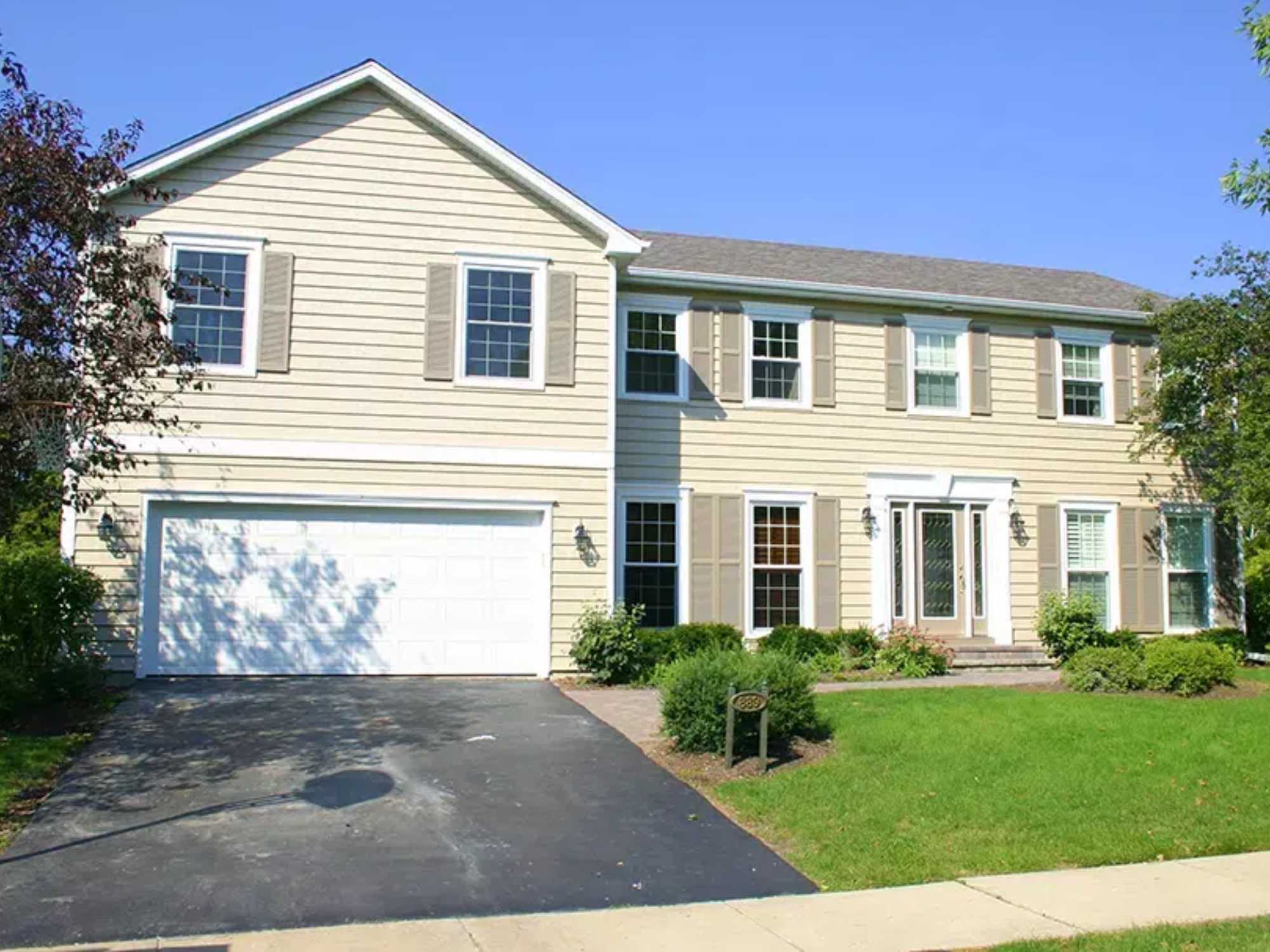 Image of a second story home addition added above the garage in Woodridge, IL by J&J Construction