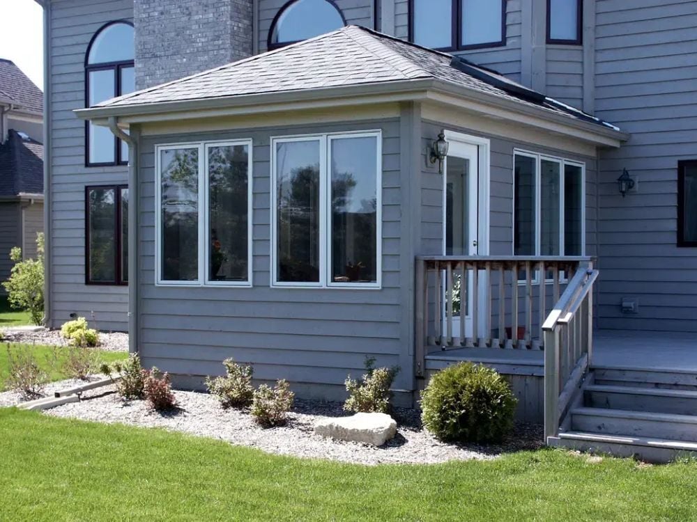 J&J Construction sunroom project for a Chicagoland area home with wraparound deck J&J Construction sunroom project for a Chicagoland area home with wraparound deck