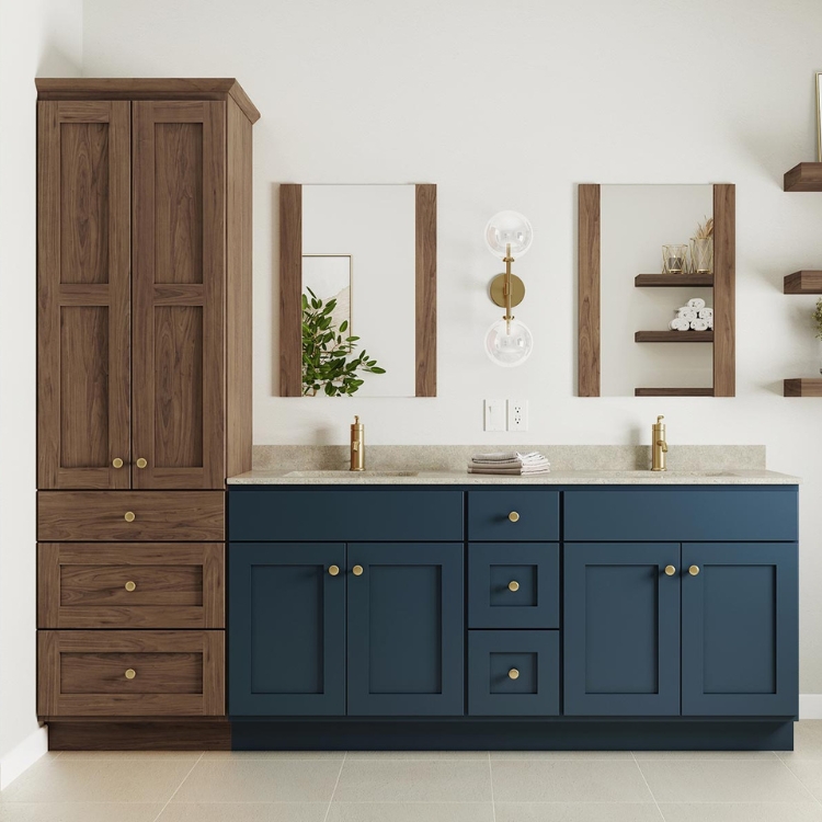 Dark blue and wood bathroom vanity with tall storage cabinet