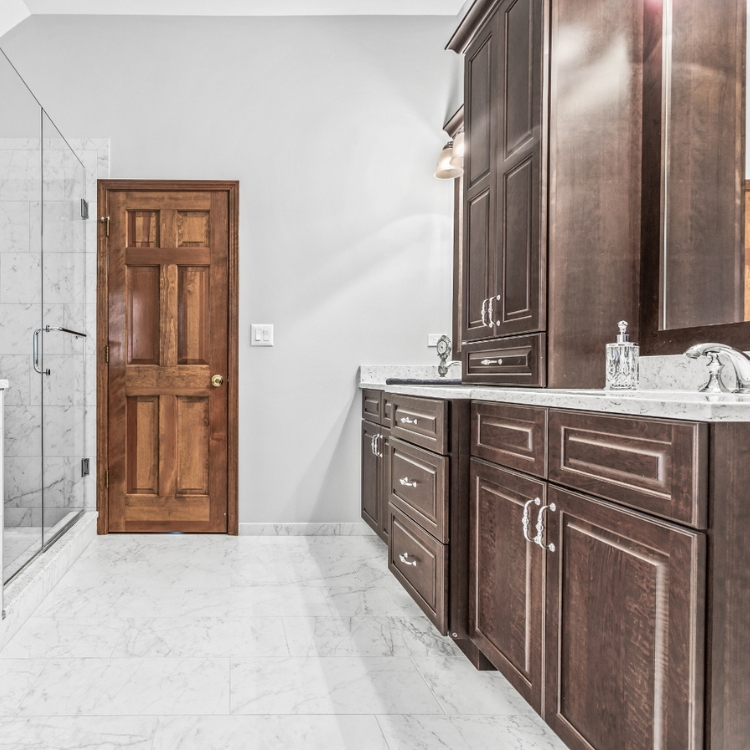 rich dark mocha colored bathroom vanity with countertop cabinet