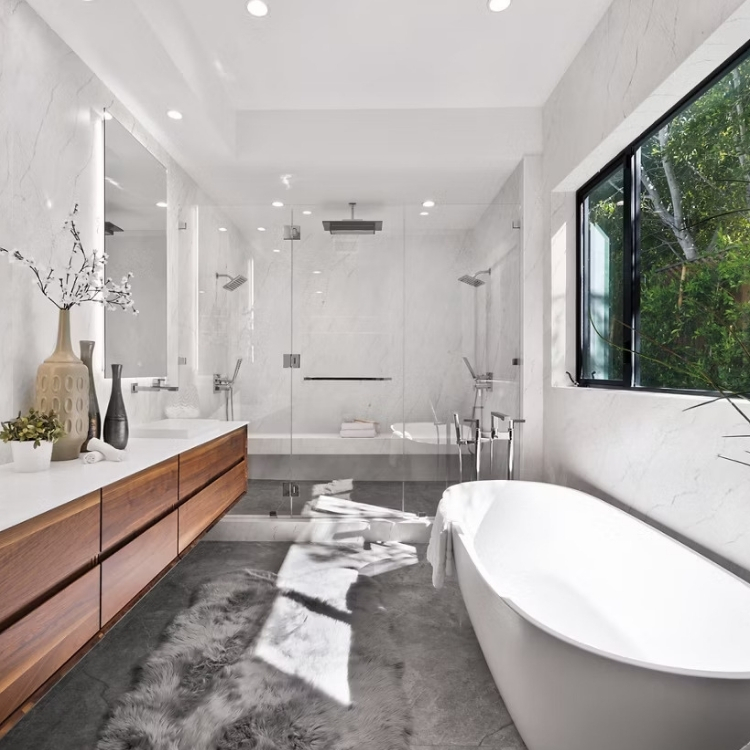 bathroom with floating vanity stand alone tub