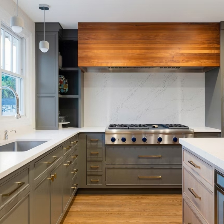 gray kitchen with wood hood and quartz countertops