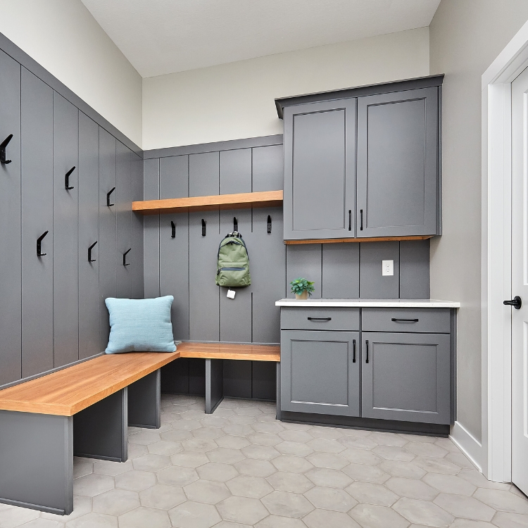 mudroom with hooks and cabinets