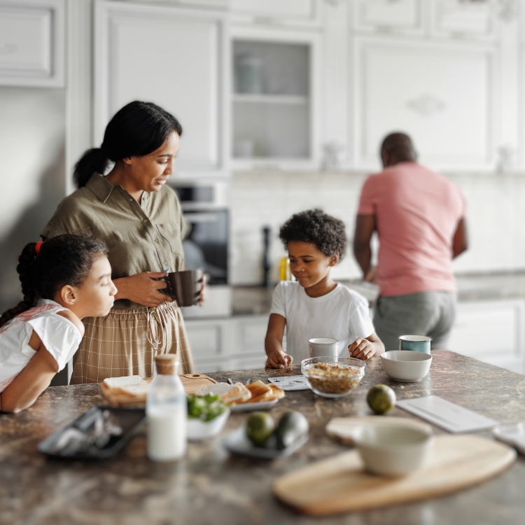 family around kitchen island