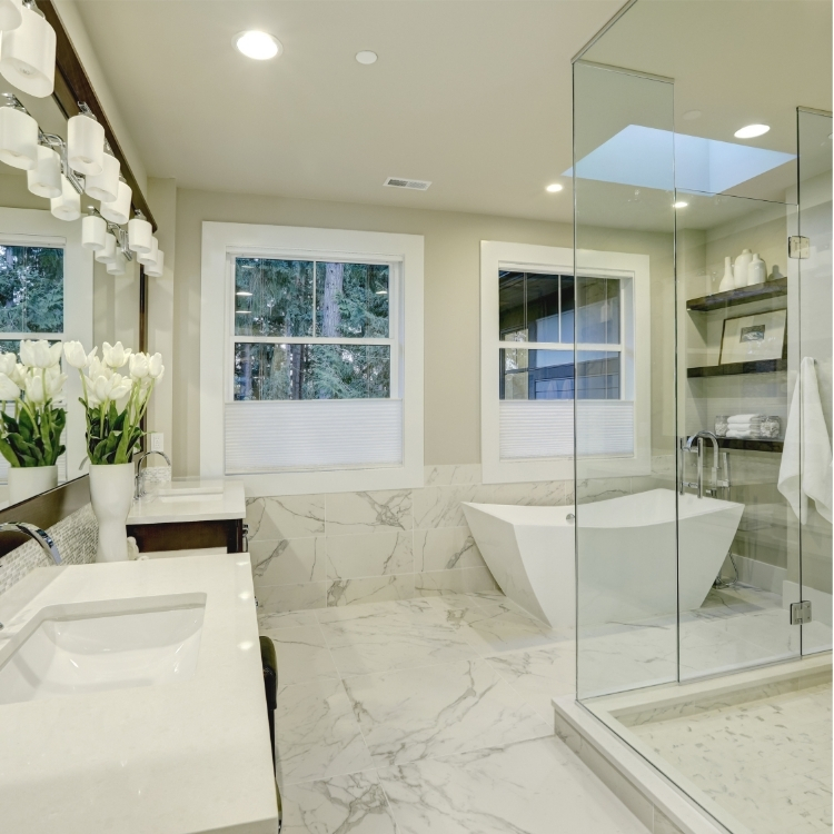 luxury master bathroom with freestanding tub